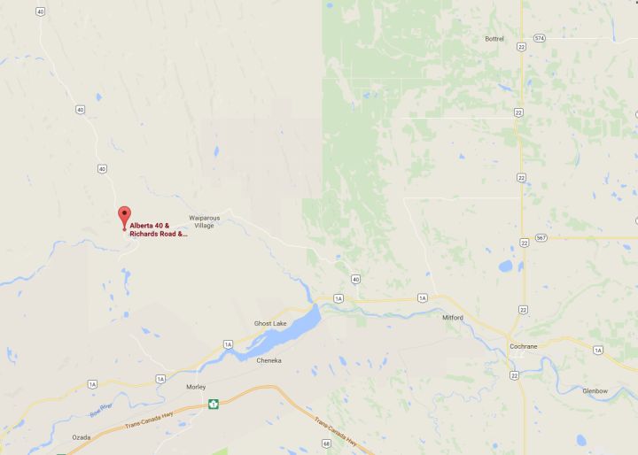 Crews were battling a fire west of Cochrane Wednesday. 