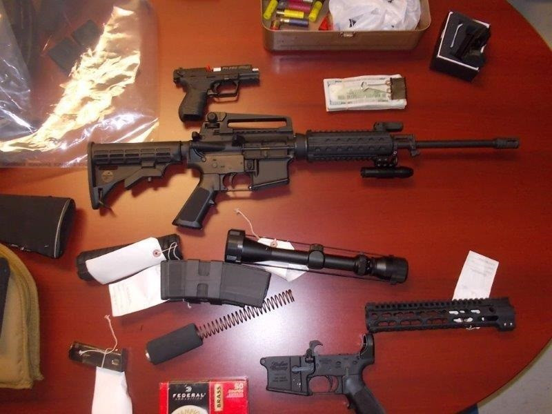 New Brunswick RCMP have charged two New Brunswickers after they attempted to cross the US-N.B. border with semi-automatic rifles and prohibited overcapacity magazines