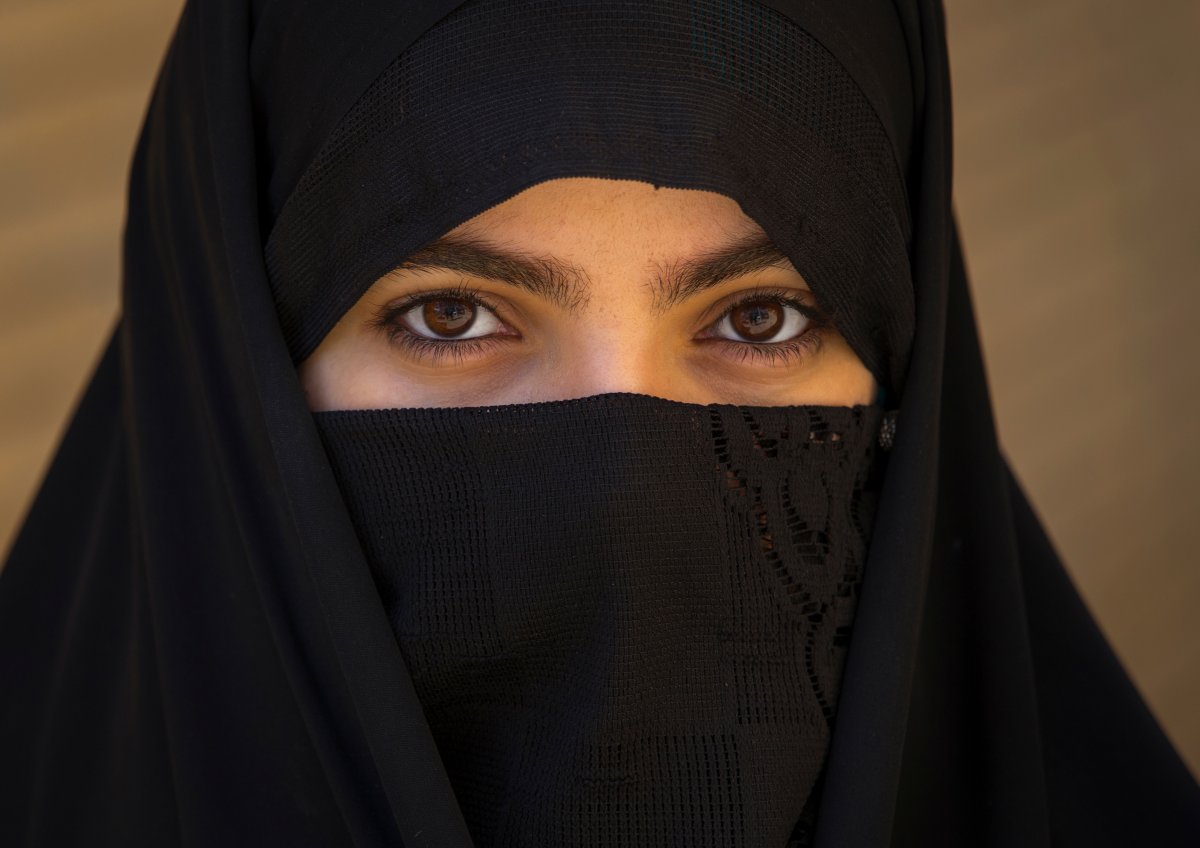 A woman wears a niqab.