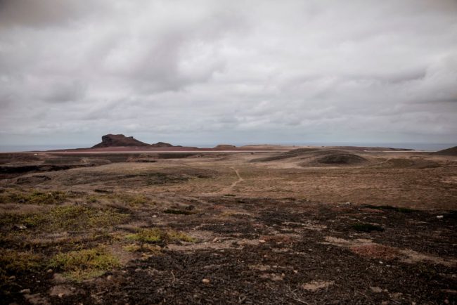 A picture taken on October 14, 2017 shows a general view of the landing strip of the newly built Saint Helena airport in the volcanic tropical island of Saint Helena, in the South Atlantic Ocean and part of the British Overseas Territory.
After five years of construction, controversy and embarrassing delays due to high winds, an airport built at a cost of £285 million (318 million euros) will welcome its first routine flight from Johannesburg.  / AFP PHOTO / GIANLUIGI GUERCIA        (Photo credit should read ).