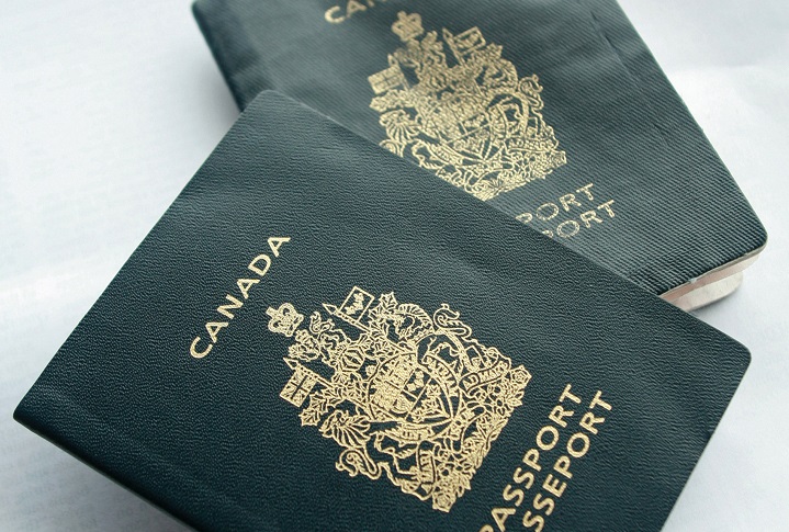 Canadian passports are arranged for a photograph in Big White, Canada, on Monday, Jan. 22, 2007, in Canada.  (Photo by Norm Betts/Bloomberg via Getty Images).