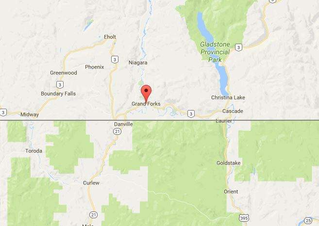 The crash happened west of Grand Forks.