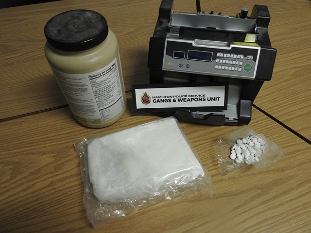 Hamilton police have charged two people in an east end drug raid.