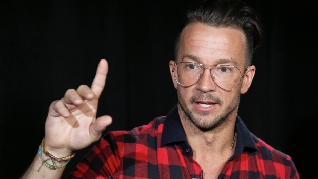 Carl Lentz, a pastor who ministers to thousands at his Hillsong Church in New York, appears during an interview, in New York. 