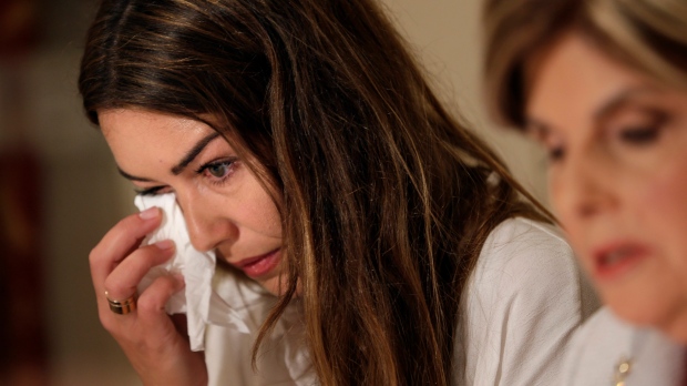 Mimi Haleyi, left, appears at a news conference with her lawyer Gloria Allred in New York, Tuesday, Oct. 24, 2017. (AP)