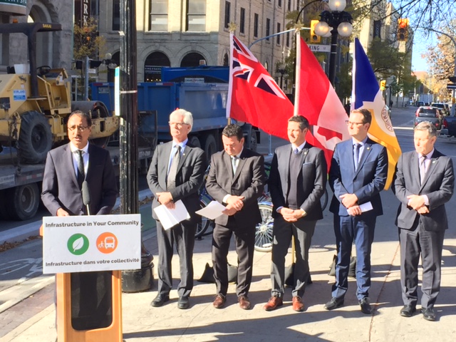 Dignitaries gather in Winnipeg's Old Market Square to make an infrastructure announcement. 