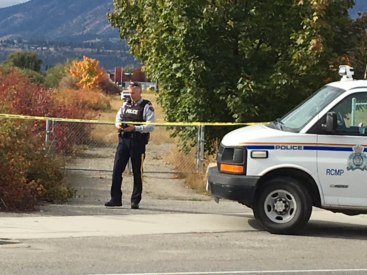 Kelowna RCMP secure the scene after a dead person was found in an orchard Wednesday.