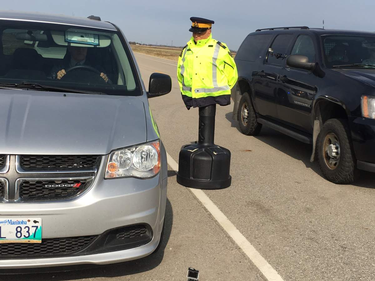 Manitoba RCMP held a road-side simulation of safety officers on a traffic stop Oct. 12.