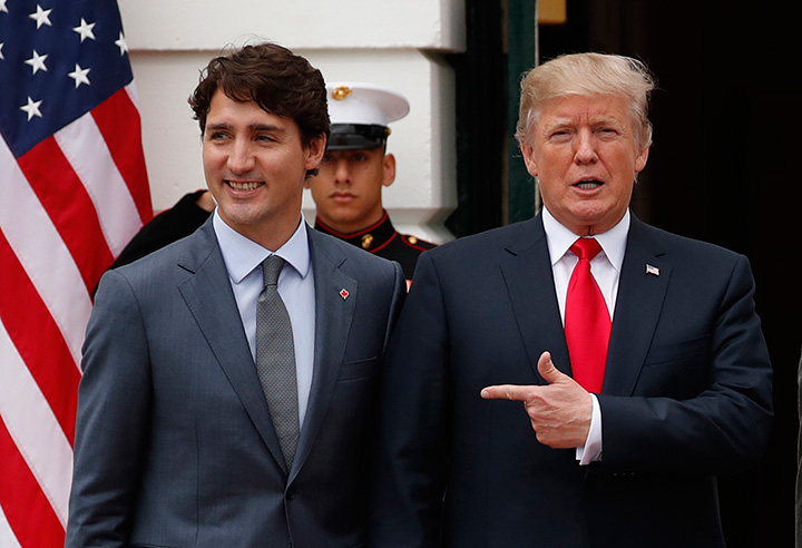 U.S. President Donald Trump welcomes Prime Minister Justin Trudeau at the White House in Washington, D.C., on Oct. 11, 2017.
