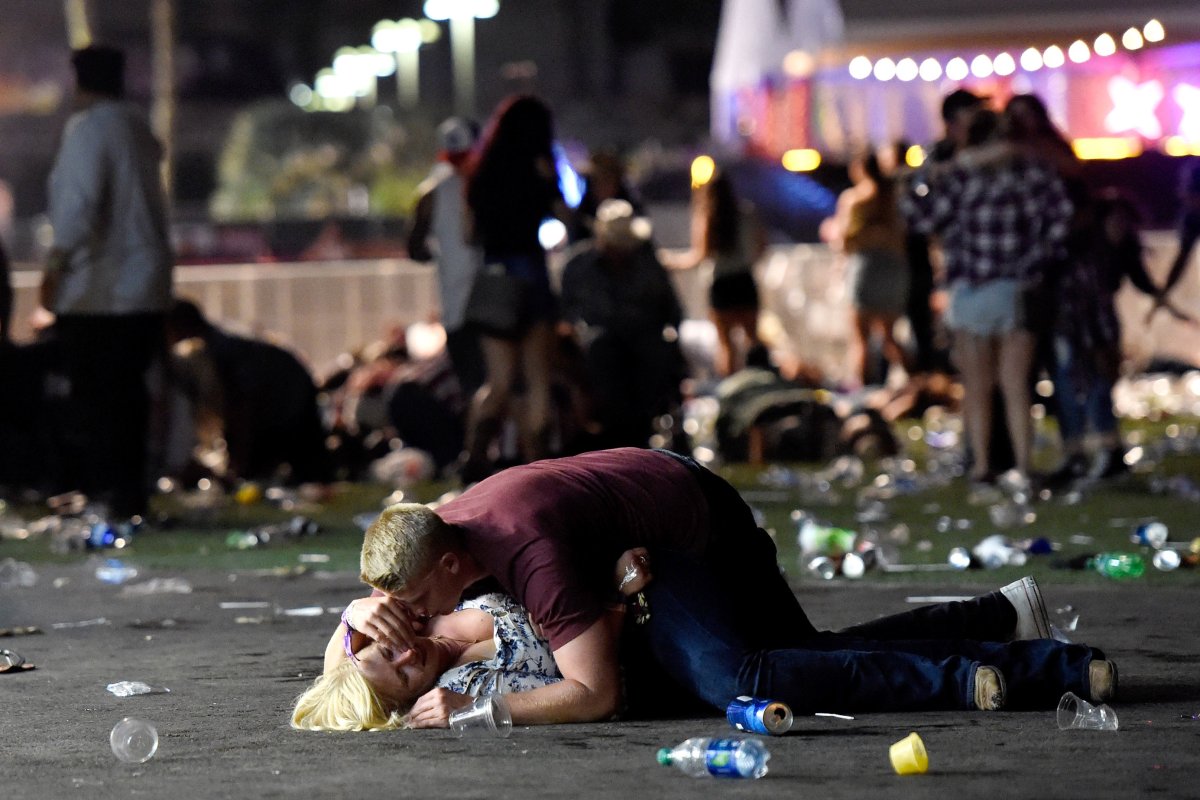 This dramatic photo of Vancouver couple Quinn Mell-Cobb and Madison Milford taking cover during the mass shooting at the Route 91 Harvest country music festival in Las Vegas was seen around the world.