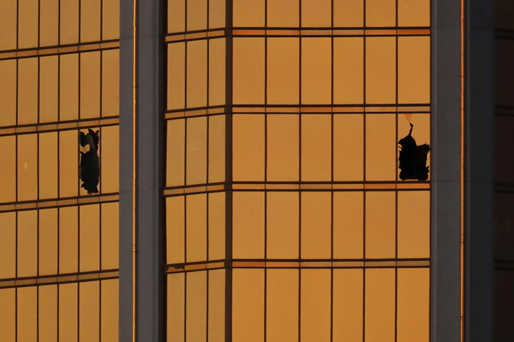 Morning light reflects off the Mandalay Bay Hotel and the broken windows where shooter Stephen Paddock conducted his rampage from the 32nd floor in Las Vegas, Nevada, October 3, 2017.
