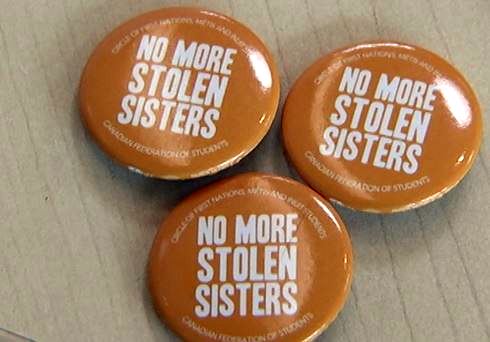 Buttons reading No More Stolen Sisters