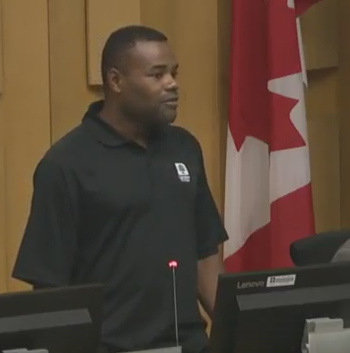 Coun. Mo Salih addresses London city council before vote to join London police services board.