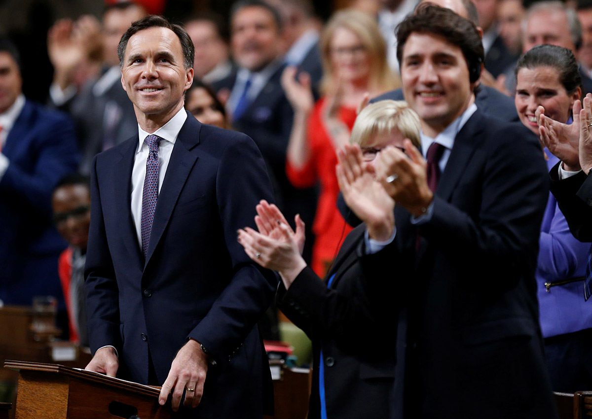 Canada's Finance Minister Bill Morneau receives a standing ovation before delivering the Fall Economic Statement in the House of Commons on Parliament Hill in Ottawa.