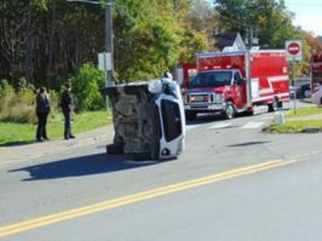 A white Mistibushi SUV flipped on it's side in New Glasgow, N.S. on October 13, 2017.