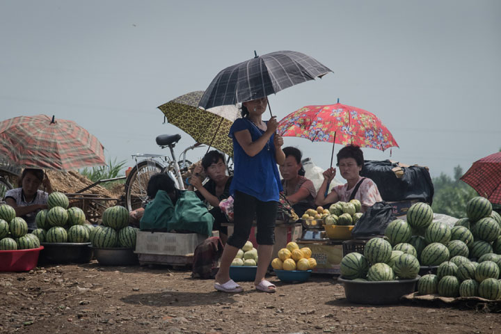 North Korean women selling fruit