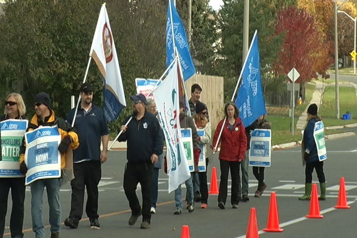 Dozens of OPSEU faculty members staged a rally on Wednesday. The strike has been going on since Oct. 15.