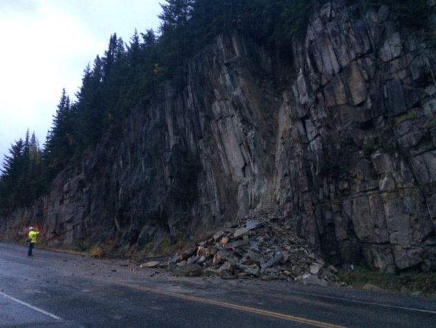 Crews on scene assessing the rock slide.
