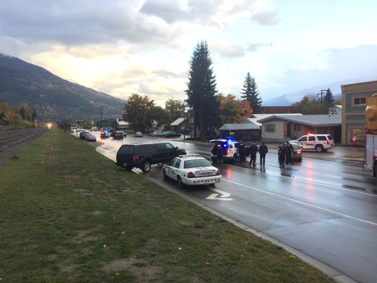 A police standoff in downtown Revelstoke Tuesday allegedly involved a murder suspect out of Calgary.