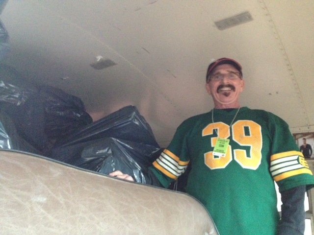 CISN Country 103.9 Scheetz Kool Bus filled with toys at Eskimos game.