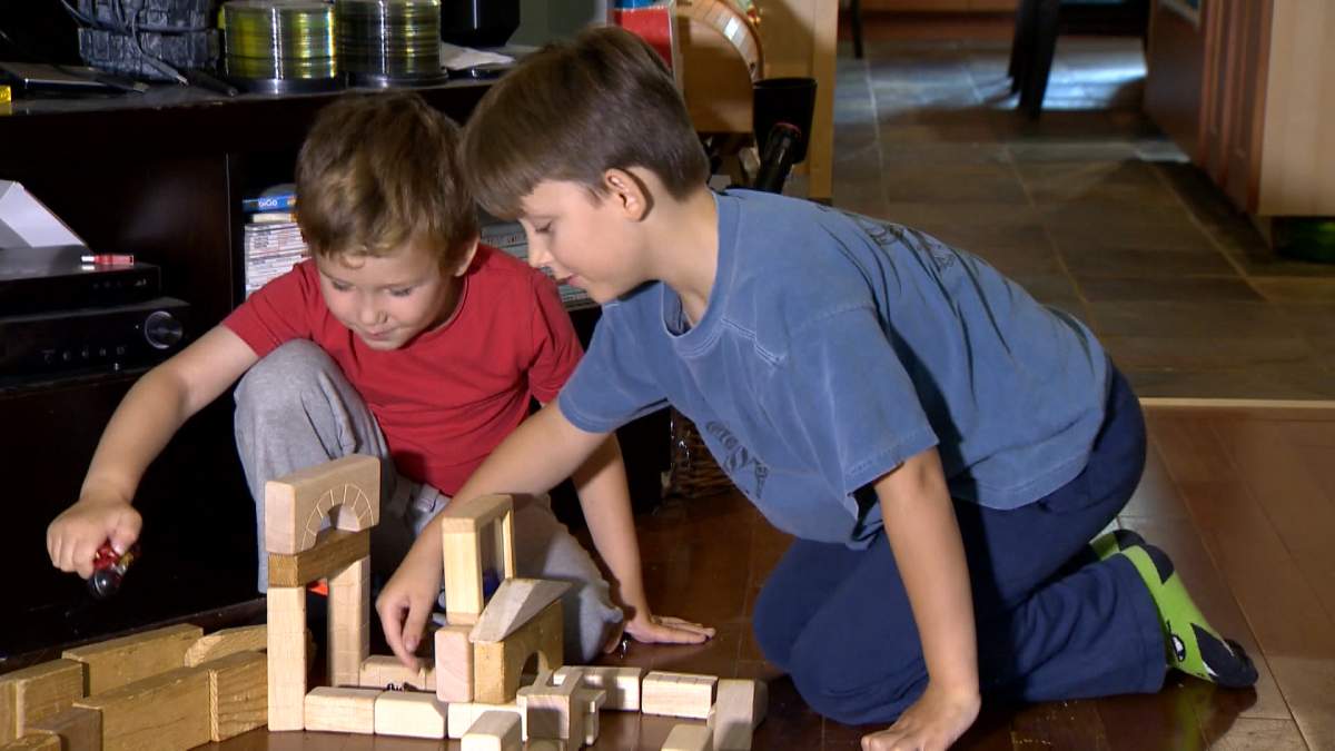 Atlas Stauffer, 5, and his brother Tenzin, 9, pictured in August 2017.
