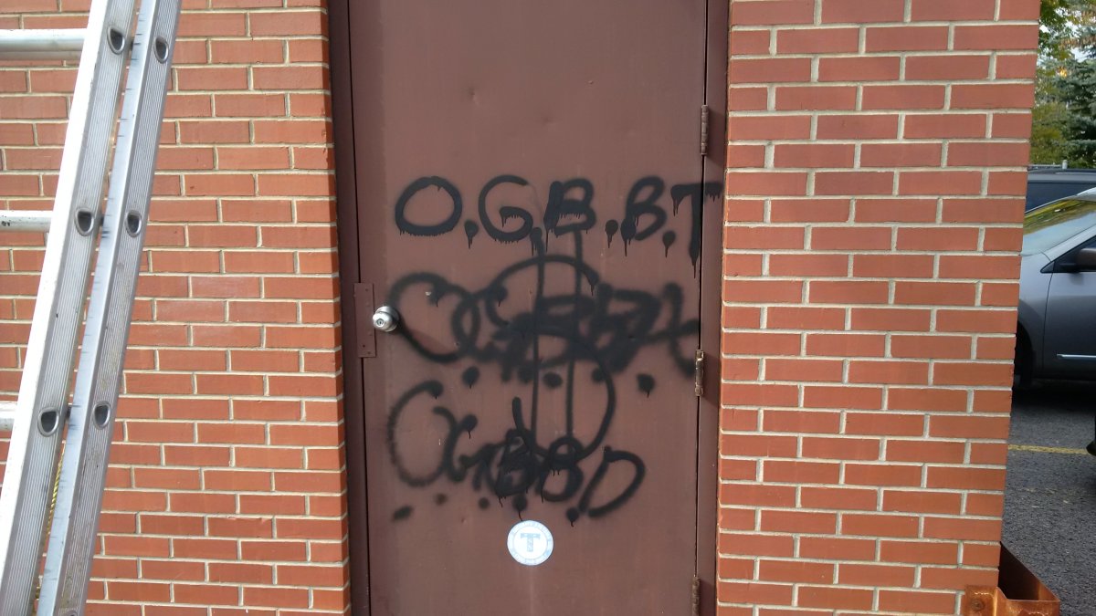 The gym door to St. John Catholic Elementary School in Peterborough was vandalized over the Thanksgiving weekend.