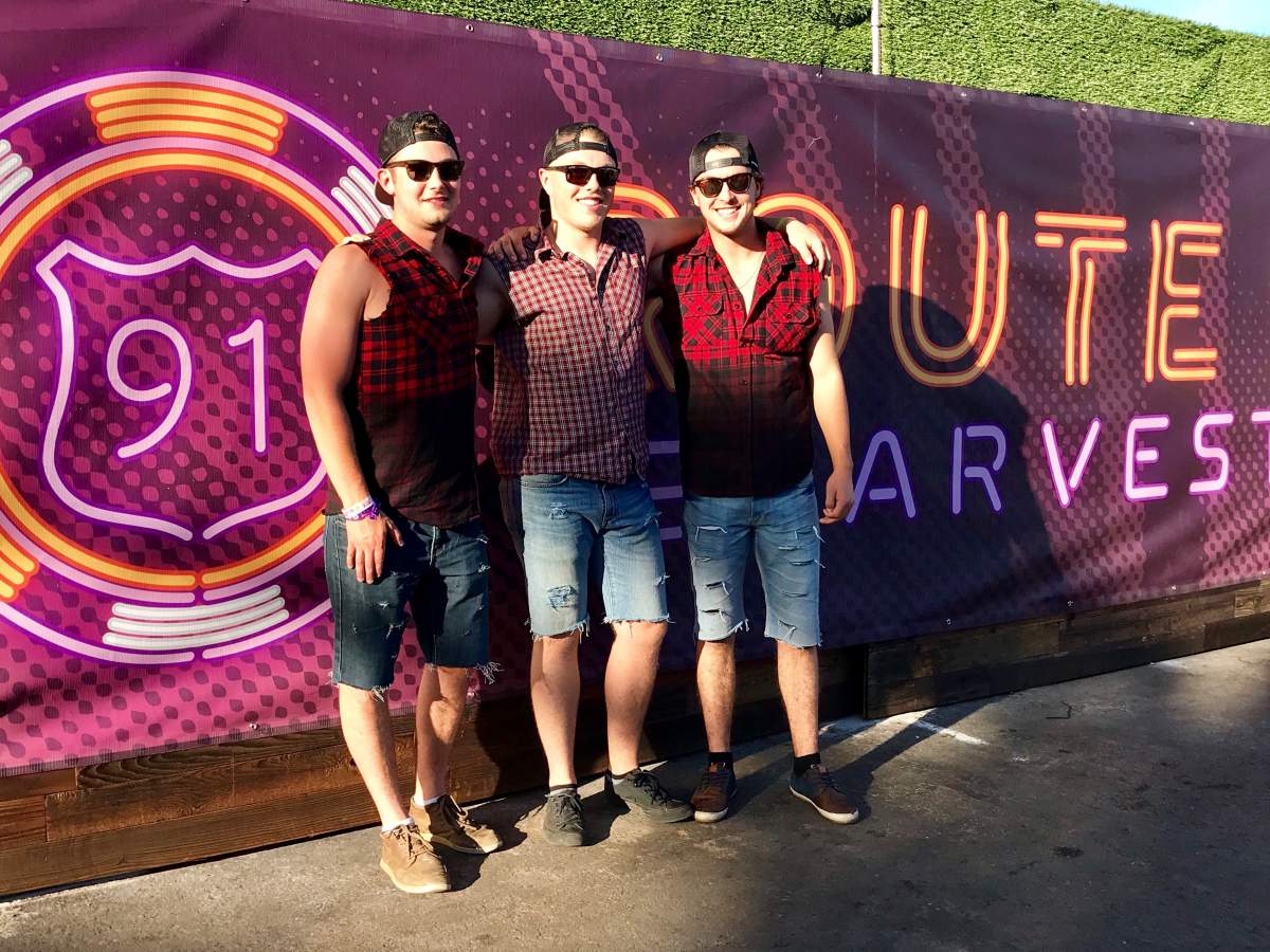 Cole Rennie, Kyle Welsh, Michael Sampson pose outside the Route 91 Harvest Festival just hours before Sunday's deadly shooting.