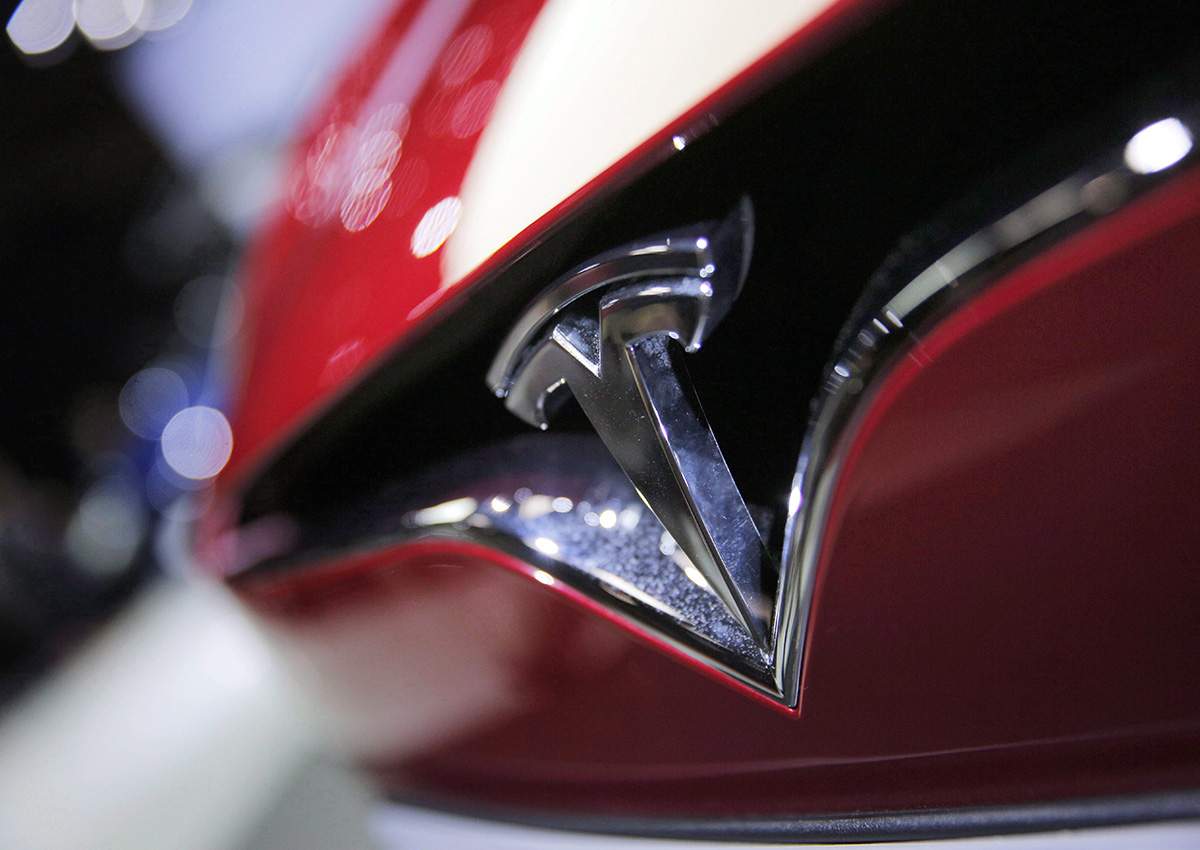 The logo of the Tesla Model S on display at the Paris Auto Show in Paris on Sept. 30, 2016. 