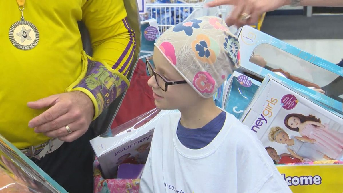 Winnipeg Starlight child Lily was treated to a 3-minute Dash at Toys'R'Us Oct. 11.