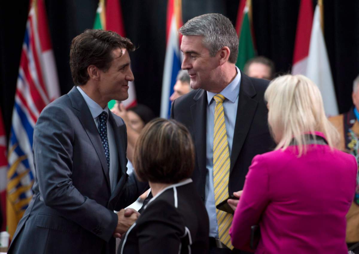 Prime Minister Justin Trudeau shakes hands with Nova Scotia Premier Stephen McNeil before the First Ministers Meeting in Ottawa, Tuesday October 3, 2017. 