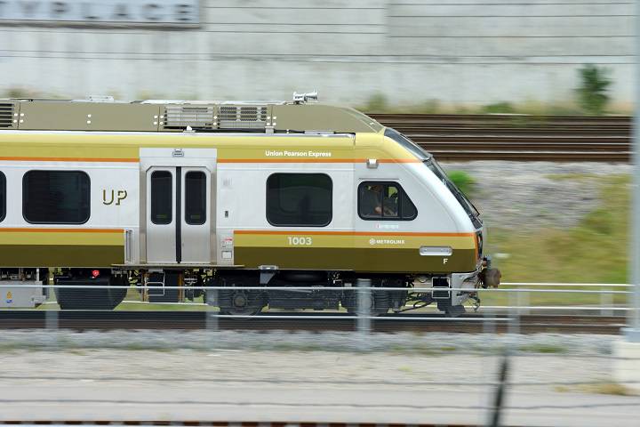 The Union-Pearson Express train is pictured in motion.