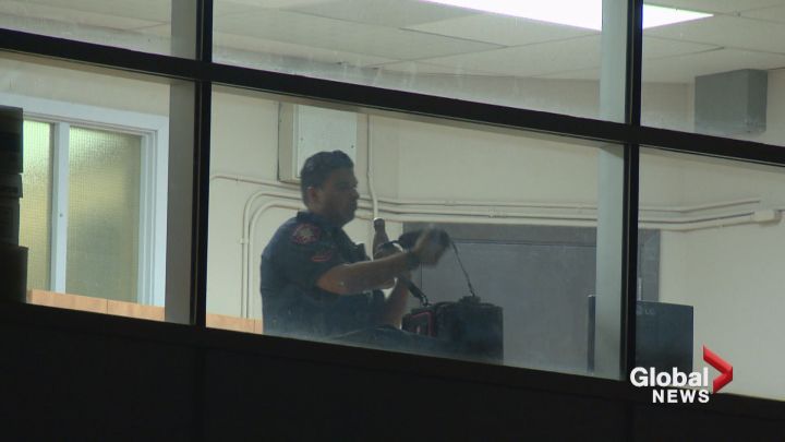 A Calgary police officer inside Western Canada High School on Oct. 5, 2017 following an altercation between teens.