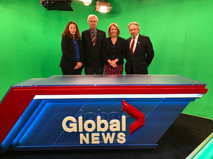Candidates for Westmount's mayoral race in the Global Montreal studio pose with Global Montreal's Senior Anchor Jamie Orchard. 