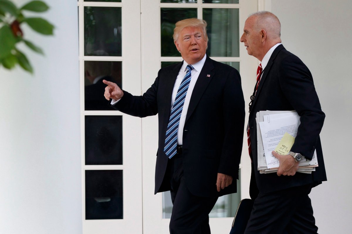 President Donald Trump walks with aide Keith Schiller to the Oval Office of the White House in Washington, Tuesday, May 2, 2017. President Donald Trump says the nation "needs a good `shutdown' in September" to fix a "mess" in the Senate, saying on Twitter that the country needs to "either elect more Republican Senators in 2018 or change the rules now to 51 (percent)," suggesting more rules changes ahead in the Senate. 