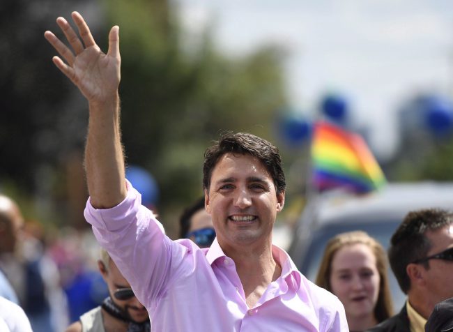 Prime Minister Justin Trudeau marches in the Ottawa Capital Pride parade, Aug. 27, 2017. 