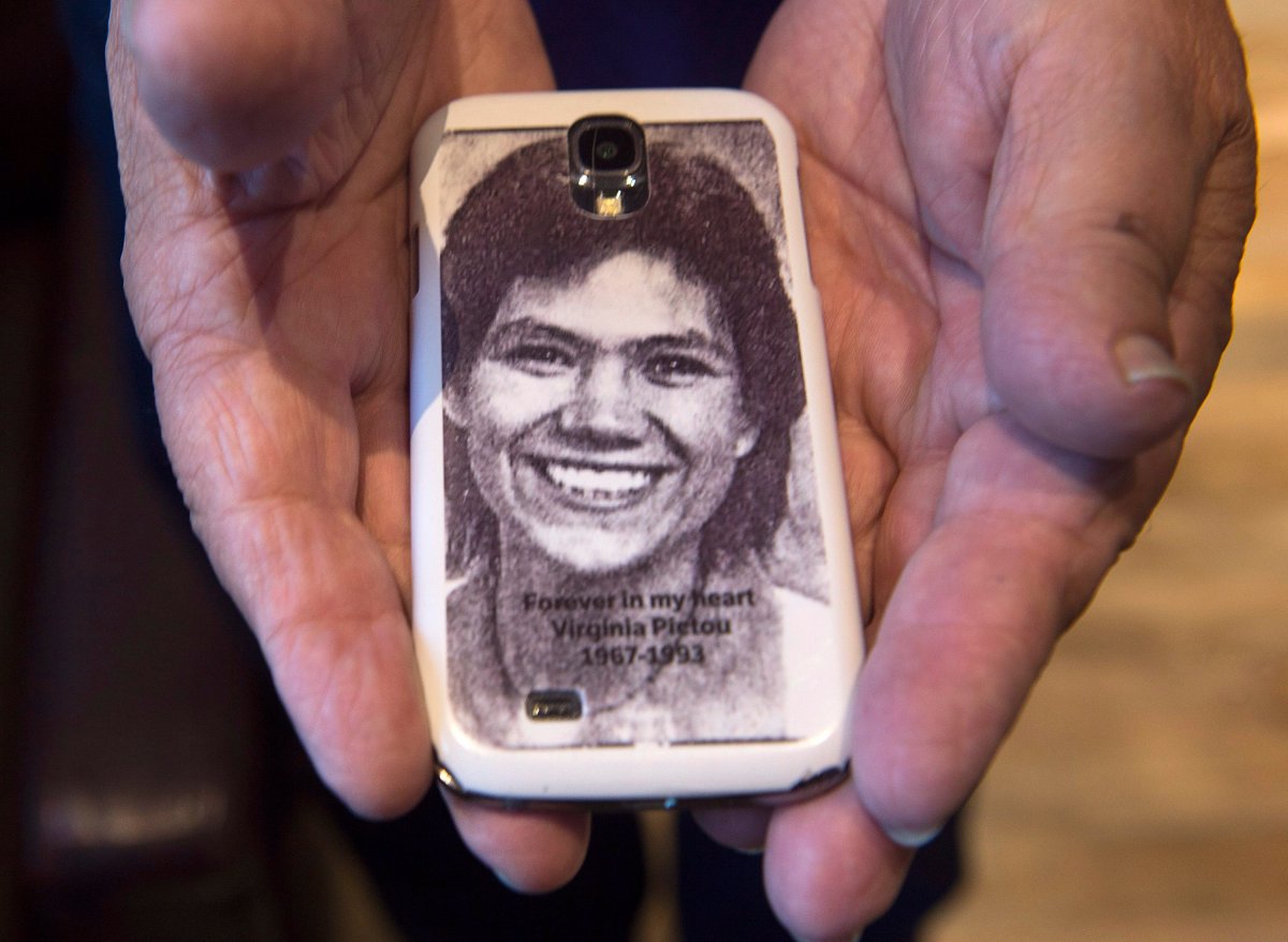 Robert Pictou, father of Virginia Pictou Noyes, displays a phone cover with a photo of his daughter as he attends the National Inquiry into Missing and Murdered Indigenous Women and Girls, in Membertou, N.S. on Tuesday, Oct. 31, 2017. 