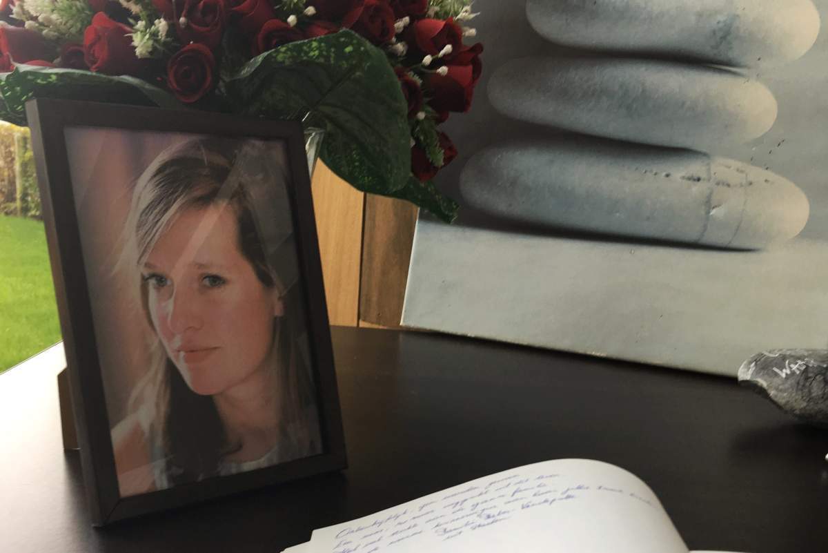 A book of condolence is open next to a portrait of victim of the New York terror attack Ann-Laure Decadt in a community centre in Staden Belgium Wednesday Nov. 1, 2017. Ann-Laure Decadt, 31 and a mother of three-year-old and three-month-old sons, was the Belgian victim in New YorkÄôs bike path attack near the World Trade Center on Tuesday.