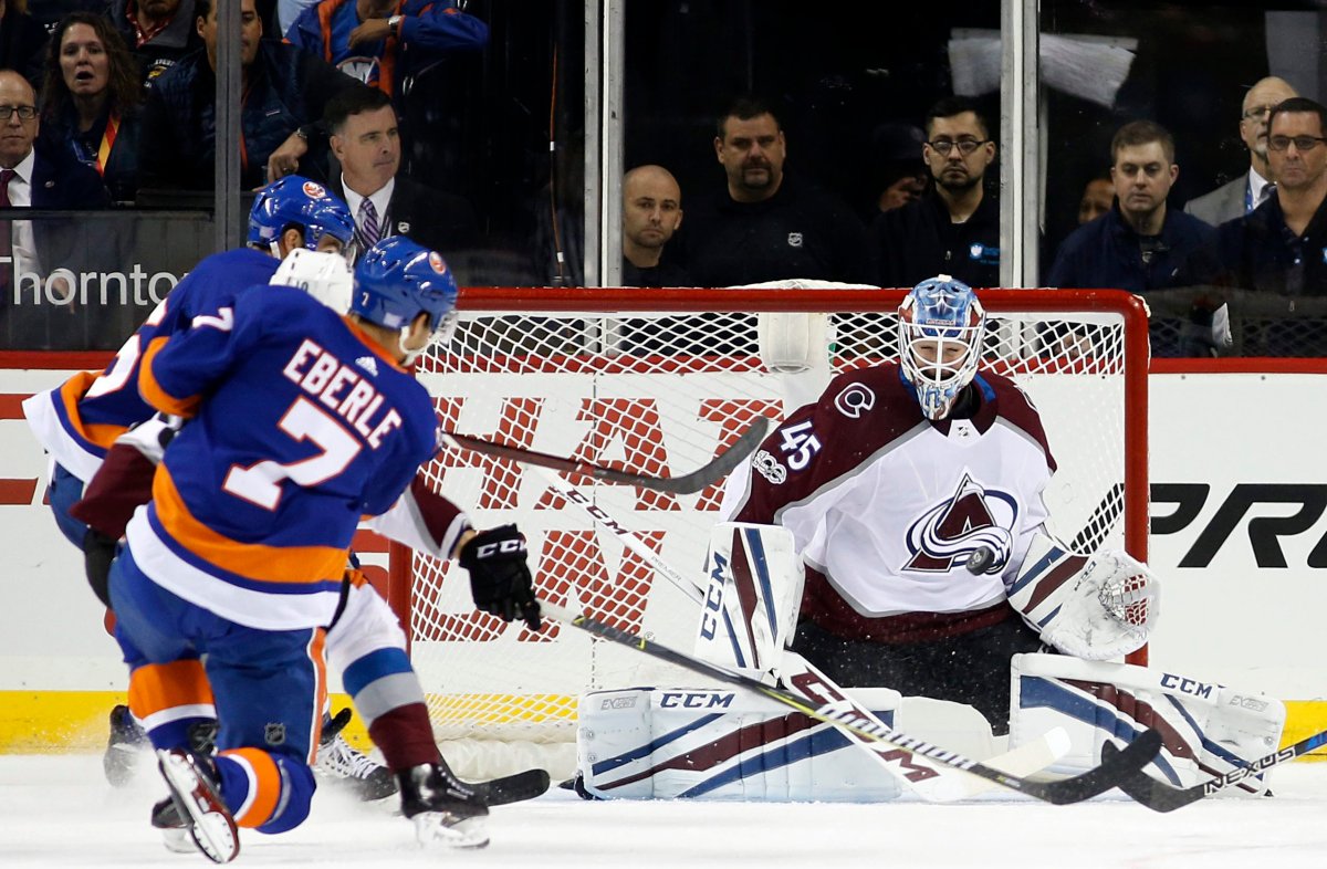 New York Islanders center Jordan Eberle (7) takes a shot against Colorado Avalanche goalie Jonathan Bernier (45) for the Islanders' second goal during the first period of an NHL hockey game in New York, Sunday, Nov. 5, 2017. 