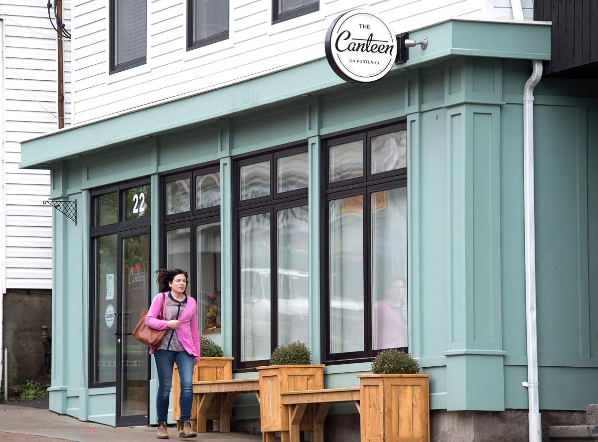 A pedestrian walks on Portland St. in downtown Dartmouth on Monday, Nov. 6, 2017.