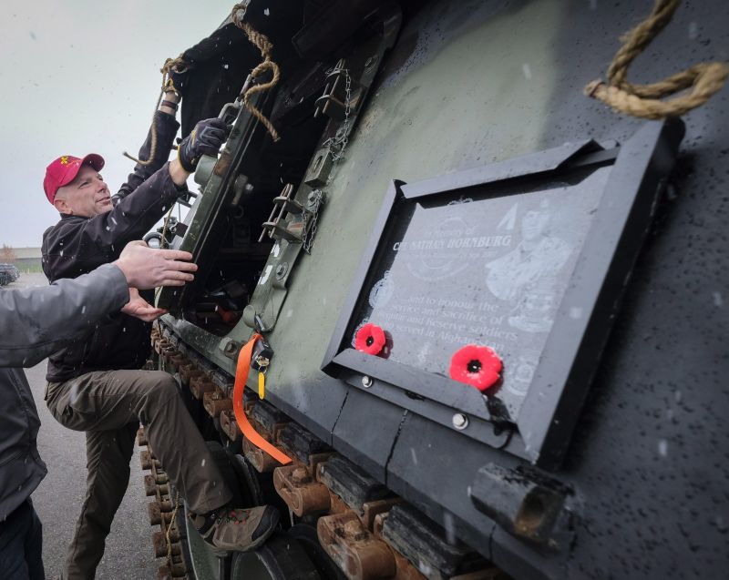 Canadian Forces veteran John Senior works on de-commissioned armoured vehicle in Calgary, Alta., Wednesday, Oct. 11, 2017.