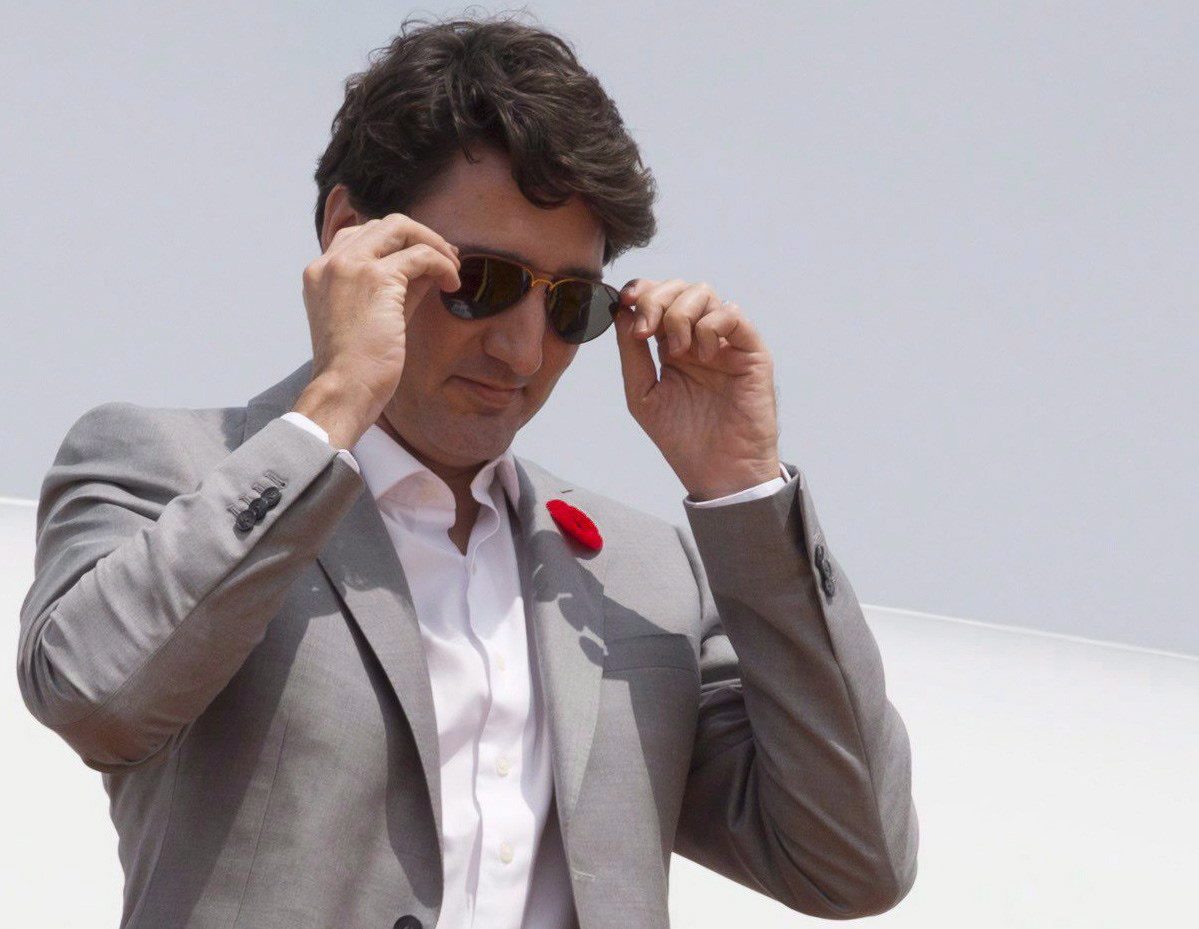 Canadian Prime Minister Justin Trudeau removes his sunglasses as he arrives in Ho Chi Minh City, Vietnam on Thursday November 9, 2017. 