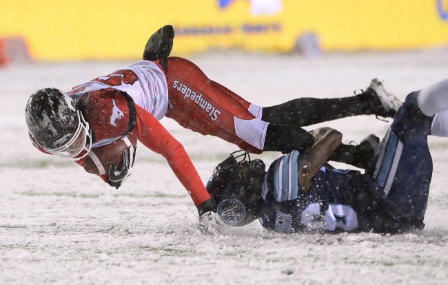 Calgary Stampeders slotback Kamar Jorden (88) is tackled by Toronto Argonauts defensive back Cassius Vaughn (26) as he makes a reception during first half CFL football action in the 105th Grey Cup Sunday November 26, 2017 in Ottawa. 
