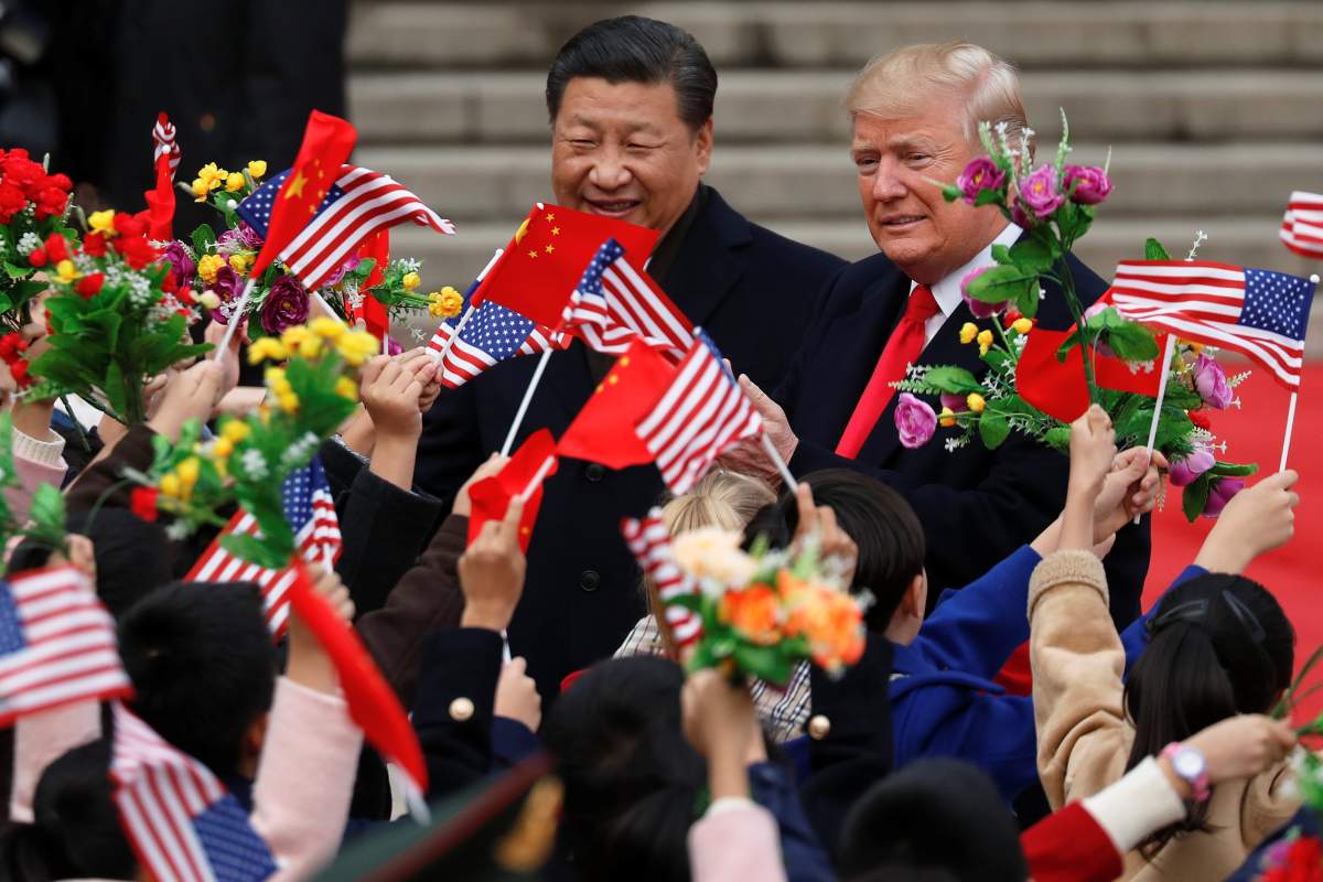 U.S. President Donald Trump takes part in a welcoming ceremony with China’s President Xi Jinping in Beijing, China, November 9, 2017.