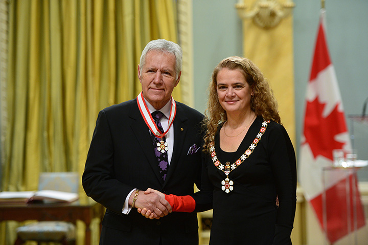 Gov. Gen. Julie Payette presents the insignia of the Order of Canada to Alex Trebek at Rideau Hall in Ottawa on Friday Nov. 17, 2017.