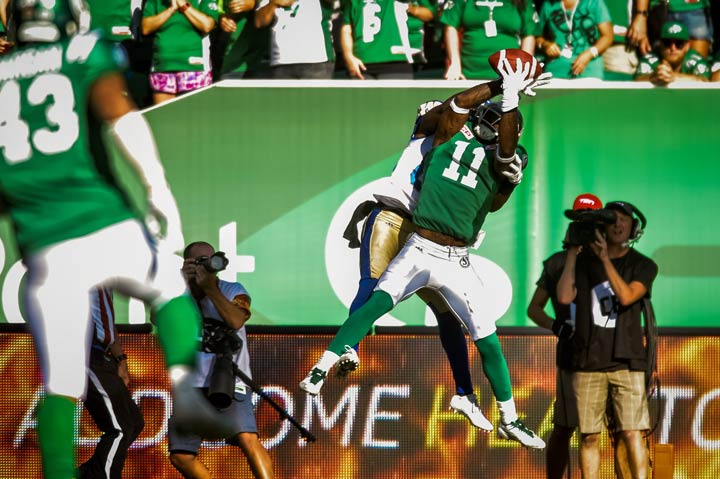 Saskatchewan Roughriders defensive back Ed Gainey makes an interception during game against the Winnipeg Blue Bombers on Sept. 3, 2017.