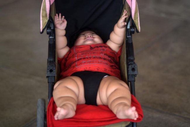 Ten-month-old Luis Gonzales and his mother Isabel Pantoja, 24, at their home in Tecoman, Colima state, Mexico, Nov. 8, 2017.