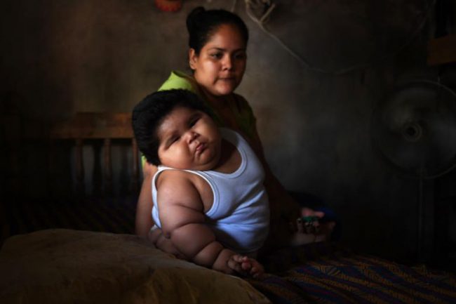 Luis Gonzales and his mother Isabel Pantoja, 24, at their home in Tecoman, Colima state, Mexico, Nov. 8, 2017.