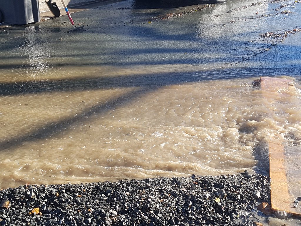Water pours down Halifax streets, floods homes after possible water
