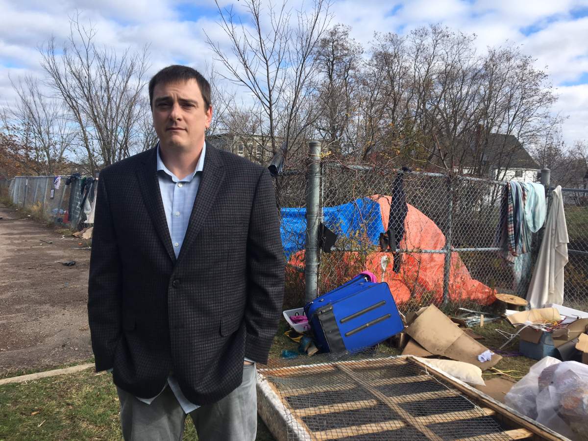 Christopher Hicks, a local resident, says the garbage and tents need to be addressed right away.