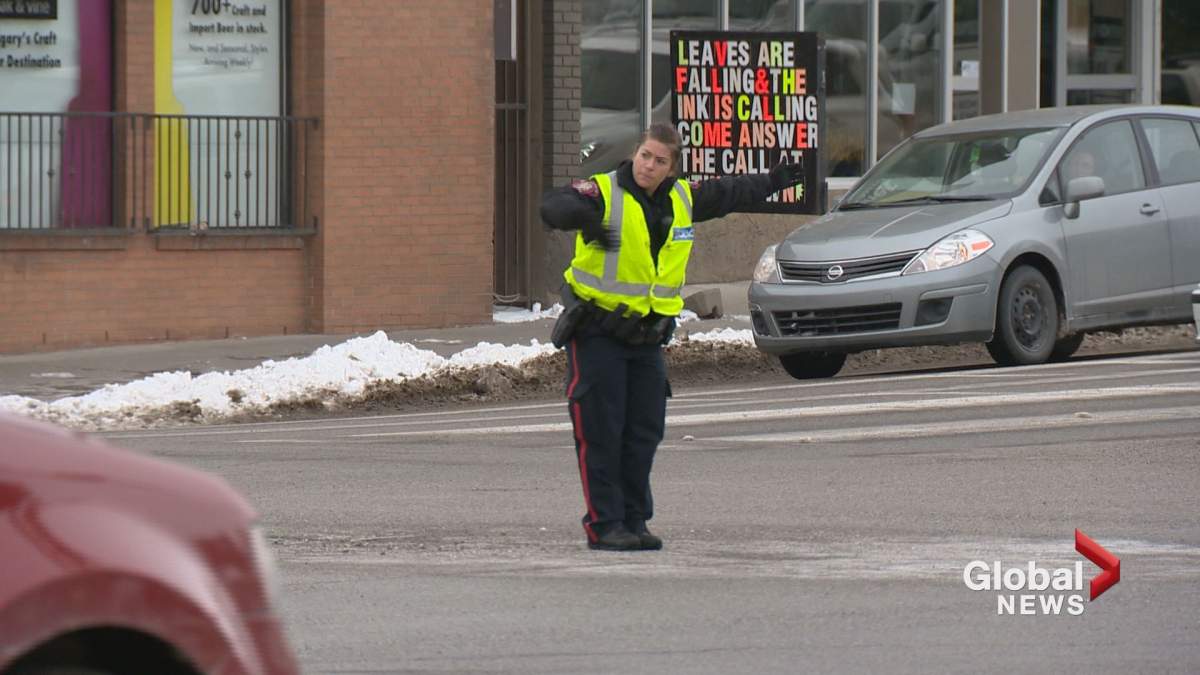 Calgary police were called to direct traffic Tuesday after a construction crane struck power lines, knocking out power in northwest Calgary.